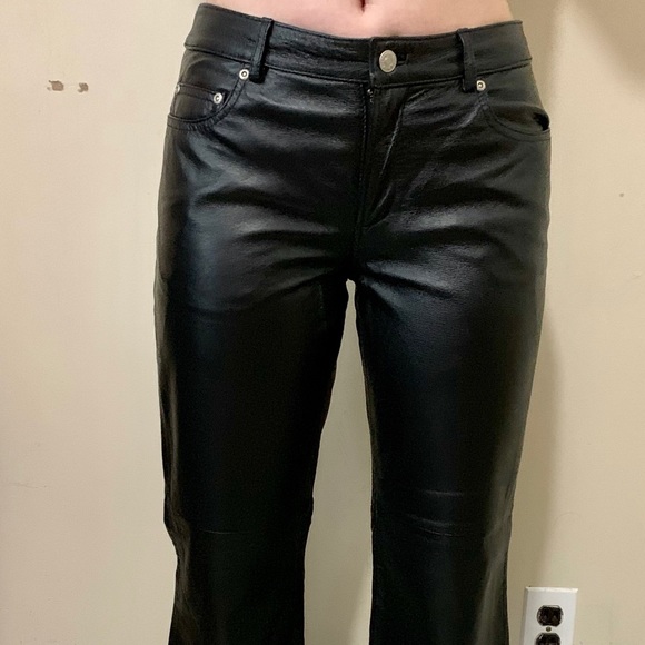 women in leather jeans